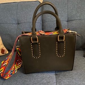 Black purse with guitar strap!